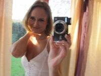 Sexy blonde amateur taking pictures of herself