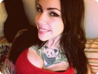 Sexy busty tattooed amateur babe