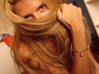 Sensual amateur blonde babe with long hair pics collection