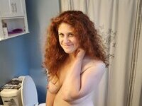 Redheaded amateur mom nude at home