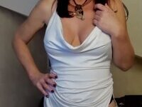 Nerdy amateur MILF showing her fake tits