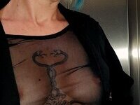 Tattooed amateur nlonde MILF teasing