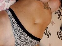 Tattooed amateur nlonde MILF teasing