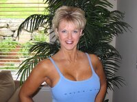 Sexy busty amateur blonde MILF homemade pics