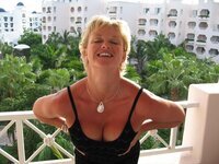 Sexy busty amateur blonde MILF homemade pics