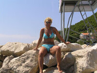 Blond mature mom at summer vacation