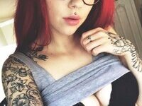 Redhead tattooed webcam slut