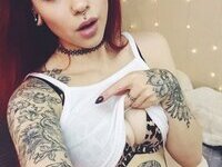 Redhead tattooed webcam slut
