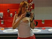 Seductive redhead babe nude posing pics collection