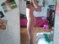 Amateur girl making nude self pics at home