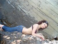 Amateur girl posing at seaside