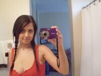 Busty amateur brunette making amazing selfies