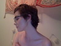 Nerdy camwhore teasing from her bedroom