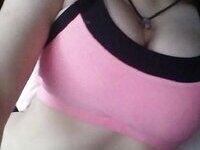 Young amateur girl showing her big tits