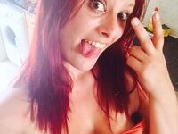 Redhead amateur babe exposing herself at nude self pics