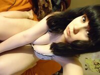 Busty amateur brunette showing her tits