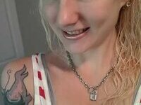 Nerdy but sexy blonde with tattooes