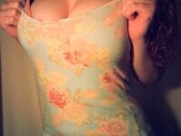 Curly and busty camwhore shy a little bit