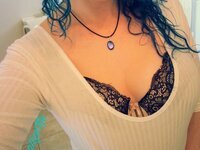 Curly and busty camwhore shy a little bit