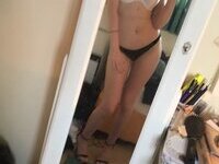 Teen babe making nude selfies