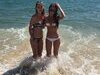 Two amateur girls at hot summer vacation