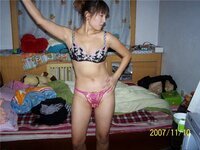 Asian amateur wife posing at home