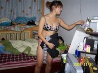 Asian amateur wife posing at home