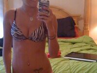 Slim and smiley blonde GF making nude selfies