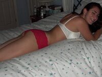 Young amateur girl posing at home