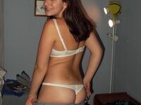 Young amateur girl posing at home