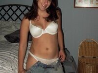 Young amateur girl posing at home