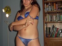 Young amateur girl posing at home