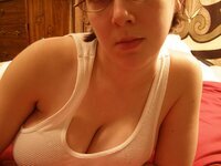 Busty amateur girl teasing at home