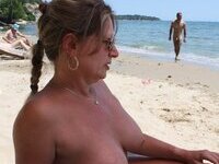 Nudist MILF on summer