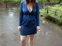 Curvy redhead with pierced nipples nude posing