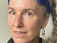46 year old gray-haired woman