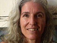 46 year old gray-haired woman
