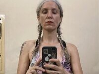46 year old gray-haired woman