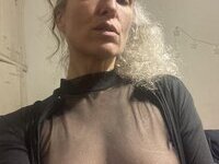 46 year old gray-haired woman
