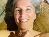 46 year old gray-haired woman