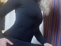 46 year old gray-haired woman