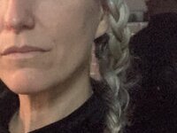 46 year old gray-haired woman
