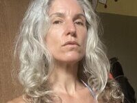 46 year old gray-haired woman