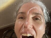 46 year old gray-haired woman