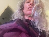 46 year old gray-haired woman