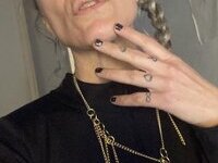 46 year old gray-haired woman