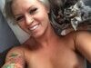 Sportive blonde mature woman nude at mirror