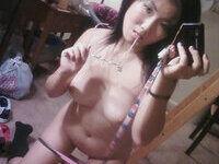Busty Asian selfie nudes