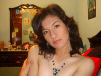 Sweet hairy Latina posing naked at home
