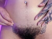 Less showing all her tattoos